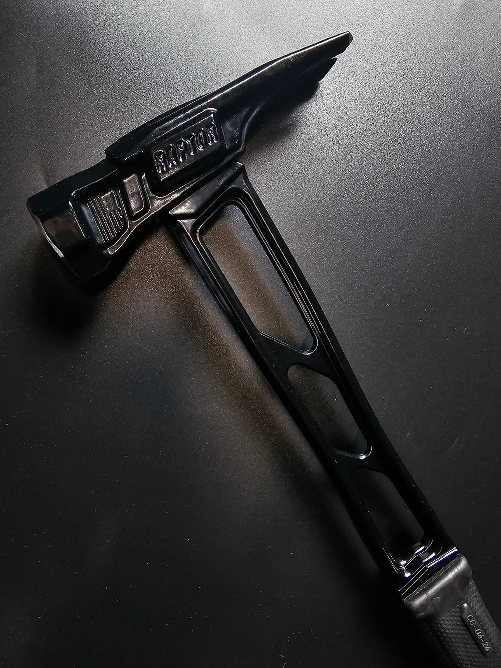 Lightweight Black Ops Titan hammer with precision CNC machined titanium handle.